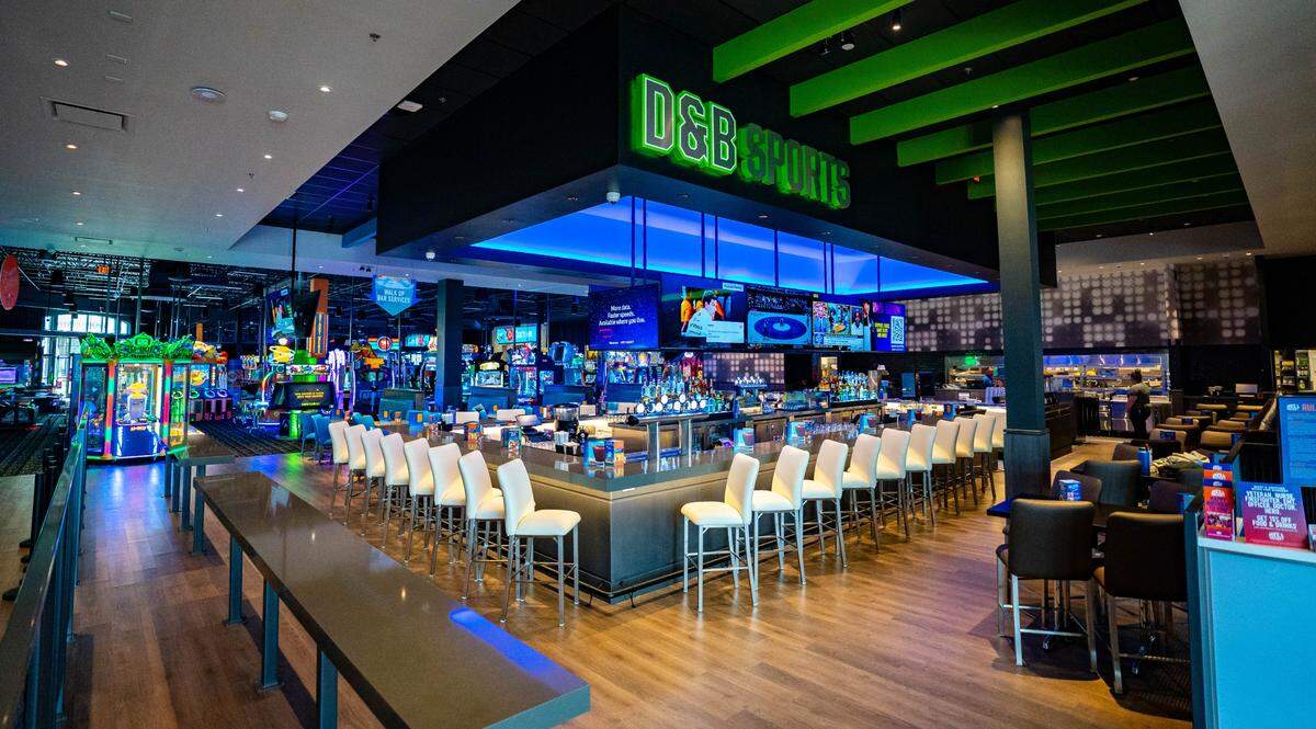 A sports bar area sits in the middle of Dave & Buster’s in Folsom on Tuesday, March 26, 2024.