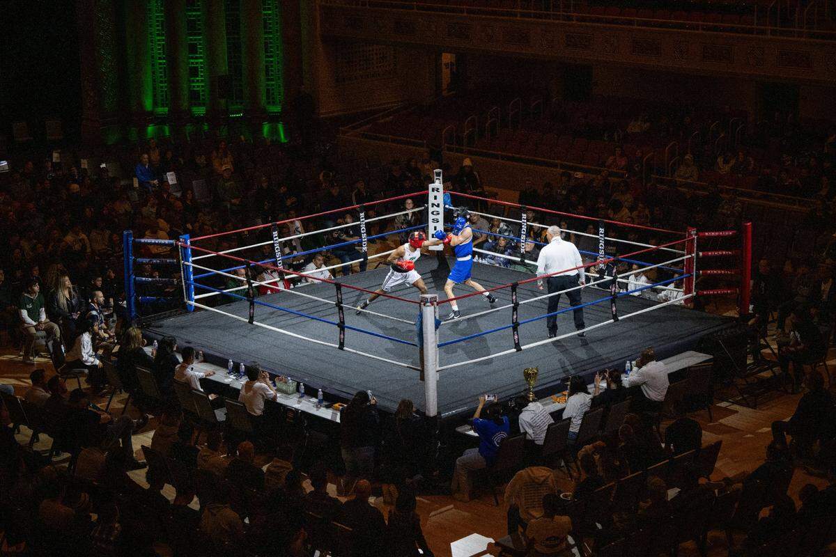 Allen Miranda of Sacramento State fights against UC Davis’ Conner Suen during the Causeway Boxing Classic at Memorial Auditorium on Friday.