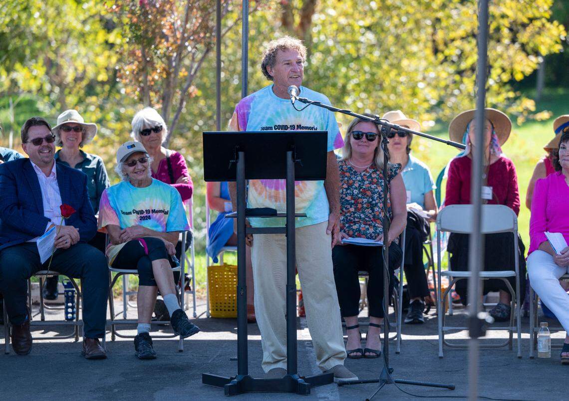 Stephen Souza, vice chair of the Davis Cemetery District and memorial construction lead, dedicates a permanent COVID-19 Memorial on Sunday.