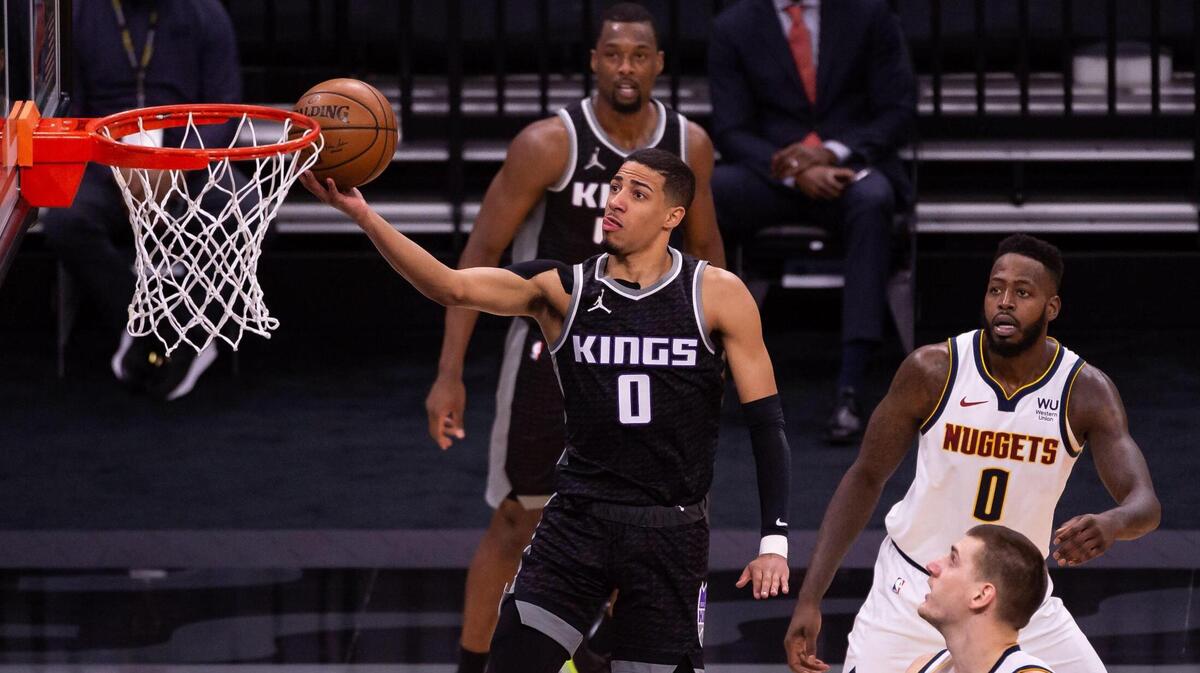 Sacramento Kings guard Tyrese Haliburton (0) easily scores on a layup in the first period against the Denver Nuggets during the NBA game Saturday, Feb. 6, 2021, at Golden 1 Center in Sacramento.