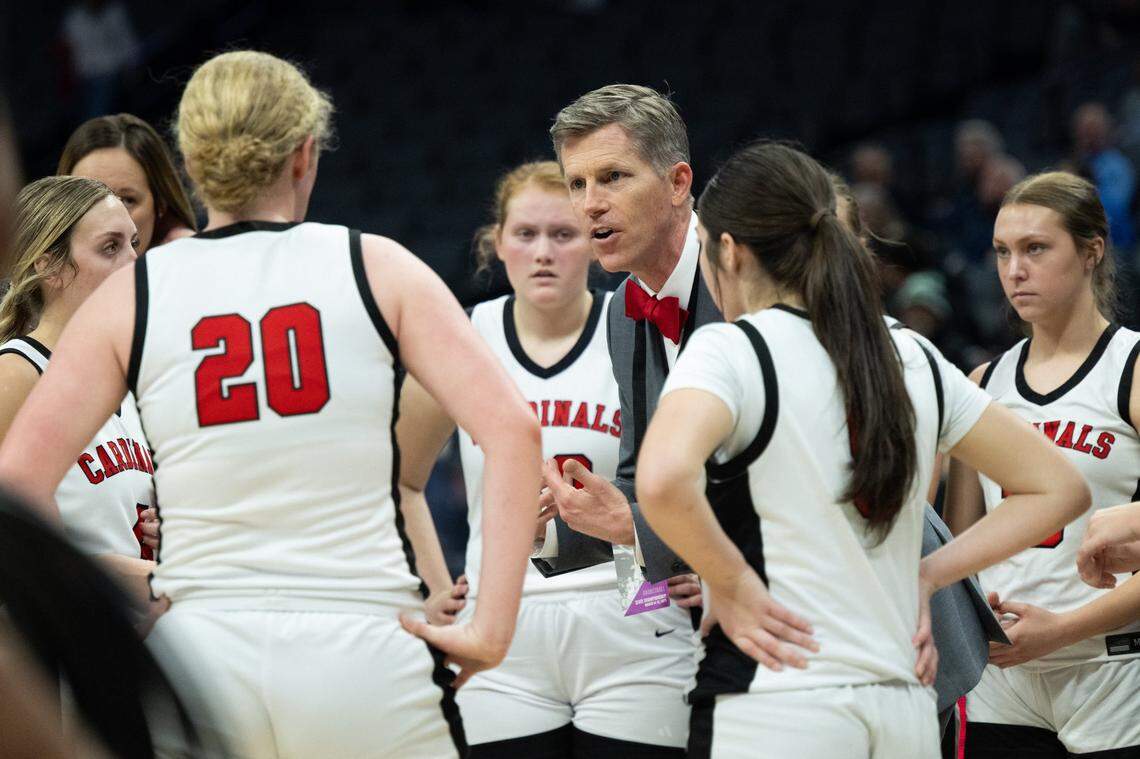 Woodland Christian Cardinals coach Shiloh Sorbello talks to players during a timeout as they lead the Rosamond Roadrunners during the CIF Division V State Championship girls basketball game at Golden 1 Center on Friday, March 14, 2025.