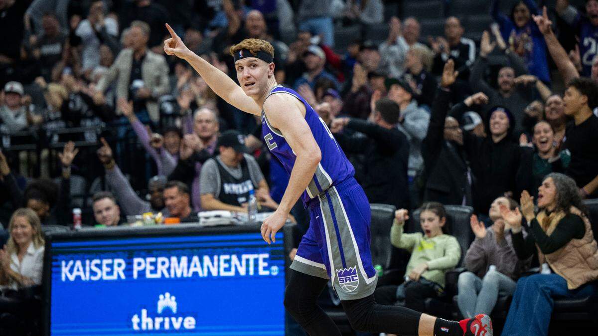 Sacramento Kings guard Kevin Huerter (9) celebrates a basket against the Utah Jazz on Friday, Dec. 30, 2022 during an NBA basketball game at Golden 1 Center in Sacramento.