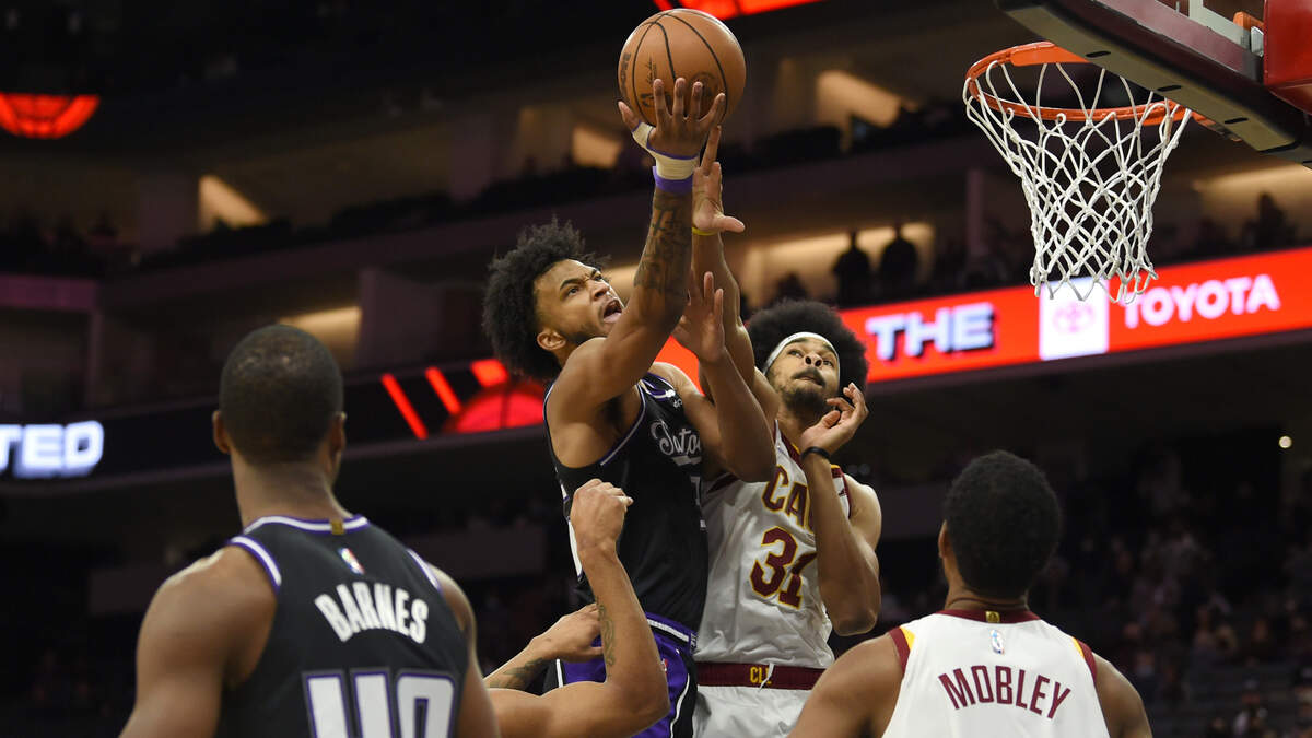Sacramento Kings Marvin Bailey drives against Cleveland Cavaliers Jarrell Allen during the first quarter at Golden 1 Center on Monday, January 10, 2022 in Sacramento.
