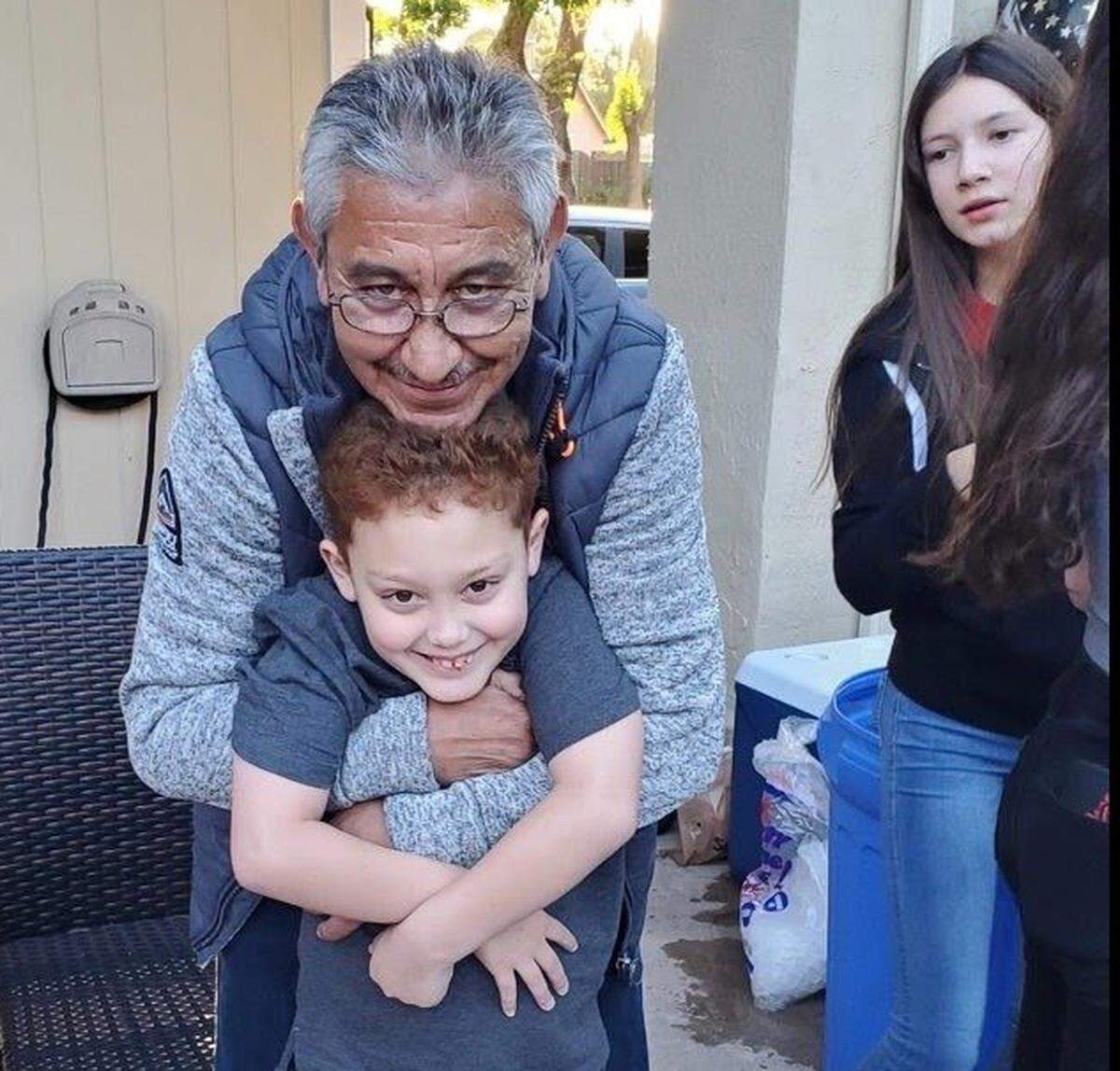 Jesus Salazar is photographed with his grandson Landon ‘Canelo’ Castillo in an undated photo. Salazar, 66, died while working at Pitman Family Farms in Sanger, California on May 6, 2023.