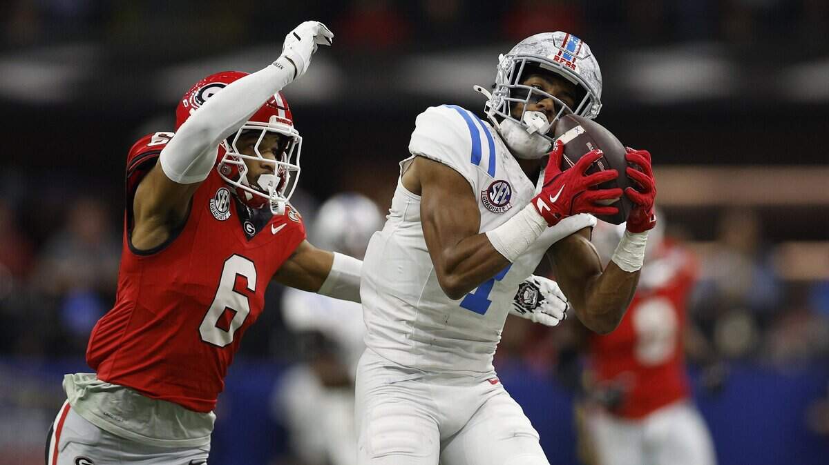NEW ORLEANS, LOUISIANA - JANUARY 01: De'Zhaun Stribling #1 of the Ole Miss Rebels makes a catch against Daylen Everette #6 of the Georgia Bulldogs during the second quarter during the 2025 College Football Playoff Quarterfinal at the Allstate Sugar Bowl at Caesars Superdome on January 01, 2026 in New Orleans, Louisiana. (Photo by Sean Gardner/Getty Images)