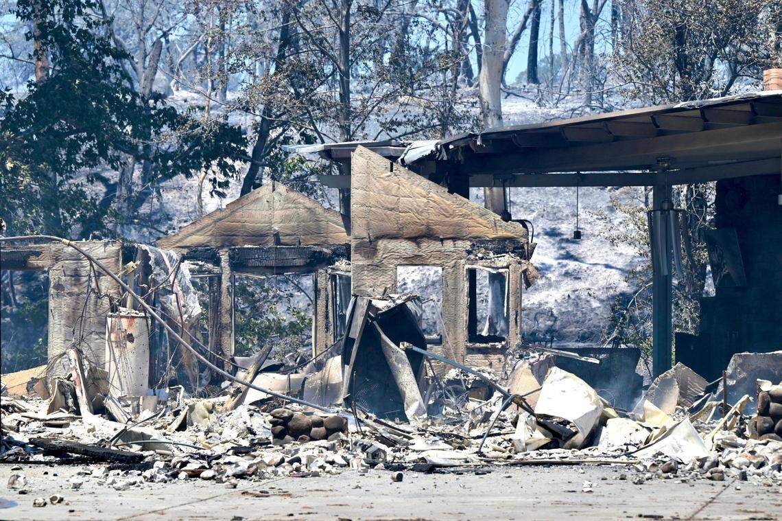 The remains of a home stand on Sycamore Road in Butte County after the Park Fire burned through the area northeast of Chico on Thursday, July 25, 2024.