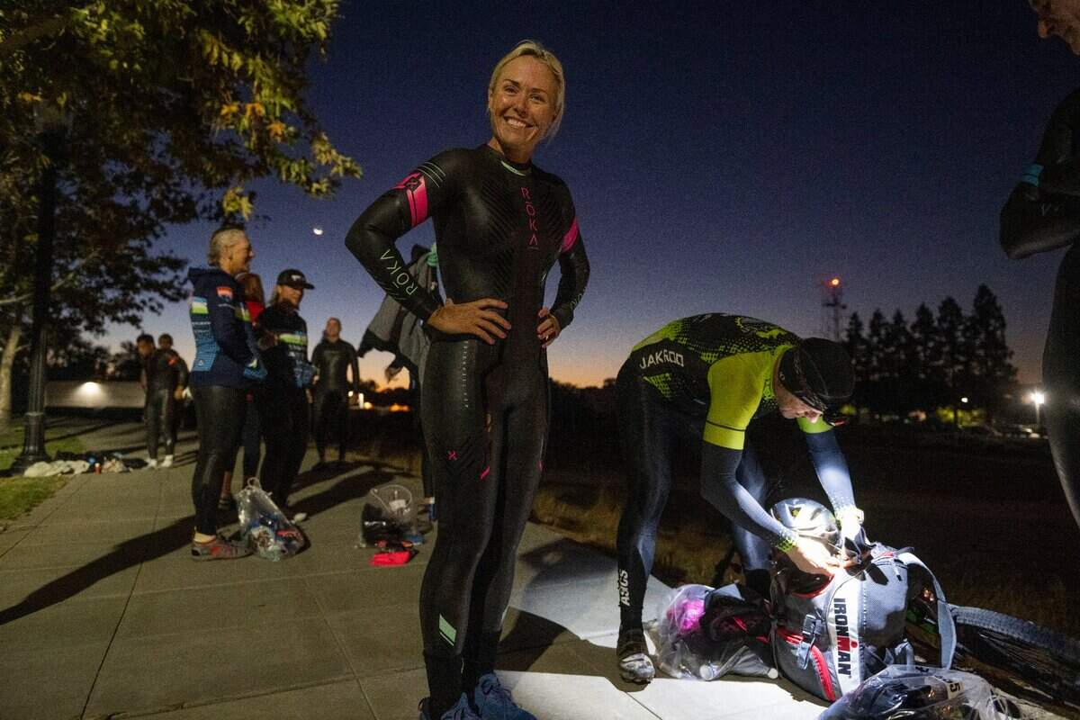 Jennifer Chebi of Thousand Oaks said before the Ironman California in Sacramento on Sunday, Oct. 23, 2022, that she was happy to finally do her first triathlon after canceled races for her in Arizona and Sacramento. Chebi’s husband Eric, who has done 11 triathlons, was her inspiration.