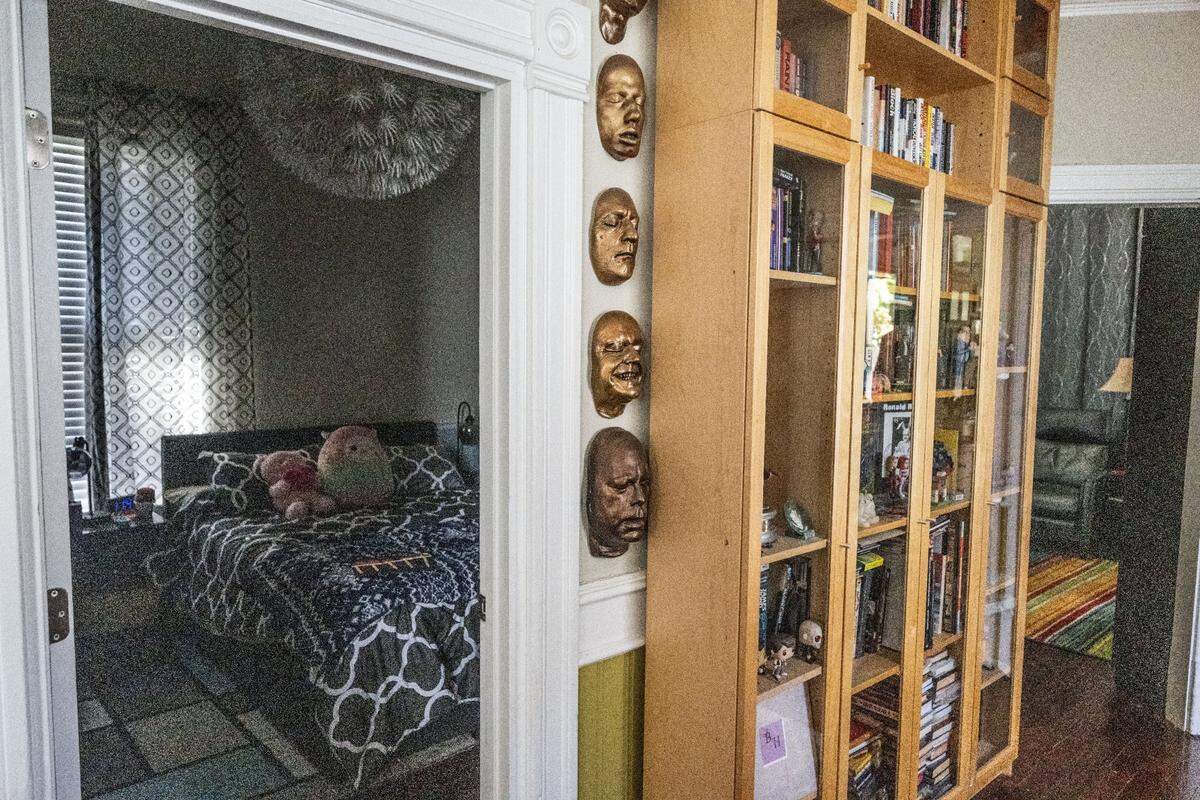 Life masks of famous actors hang in the former home of serial killer Dorothea Puente.  The home is now owned by Barbara Holmes and Tom Williams.