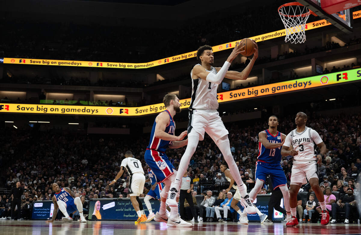 San Antonio Spurs center Victor Wembanyama (1) brings down a rebound in the second half of an NBA game against the Sacramento Kings on Sunday, Dec. 1, 2024 at the Golden 1 Center.