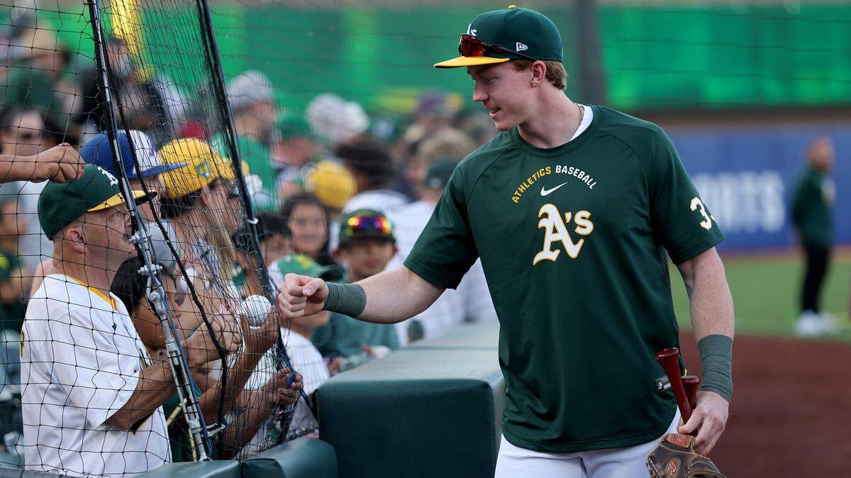 SACRAMENTO, CALIFORNIA - MAY 12: Henry Bolte #33 of the Athletics greets fans before their game against the St. Louis Cardinals at Sutter Health Park on May 12, 2026 in Sacramento, California. Bolte was called up from the minor leagues before the game against the Cardinals.  (Photo by Ezra Shaw/Getty Images)