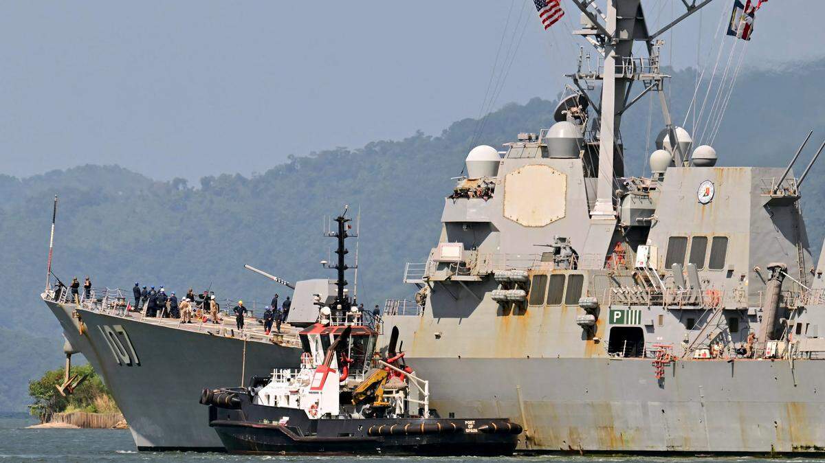 The USS Gravely, a U.S. Navy warship, departs the port of Port of Spain on Oct. 30, 2025. The Gravely arrived in Trinidad and Tobago on Oct. 26, 2025, for joint exercises near the coast of Venezuela, as Washington ratcheted up pressure on drug traffickers and Venezuelan leader Nicolas Maduro.