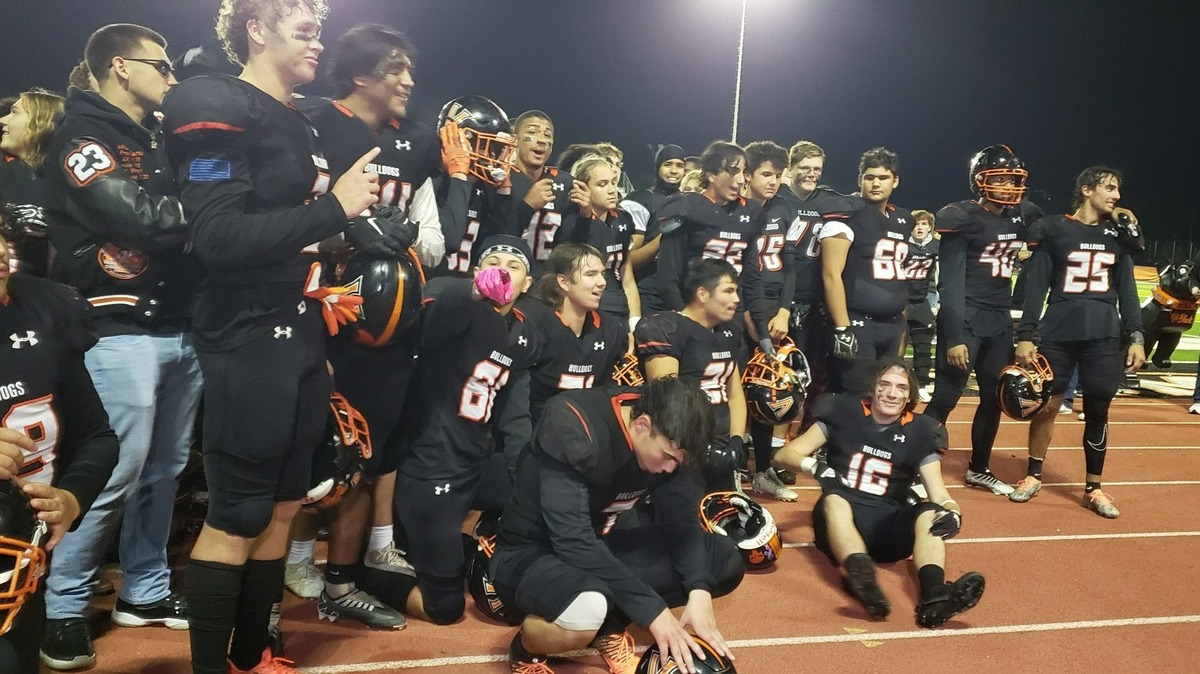 The eighth-seeded Vacaville Bulldogs advanced to the second round of the Sac-Joaquin Section Division II playoffs with a 35-20 victory over the visiting Lodi Flames on Friday at Tom Zunino Stadium.