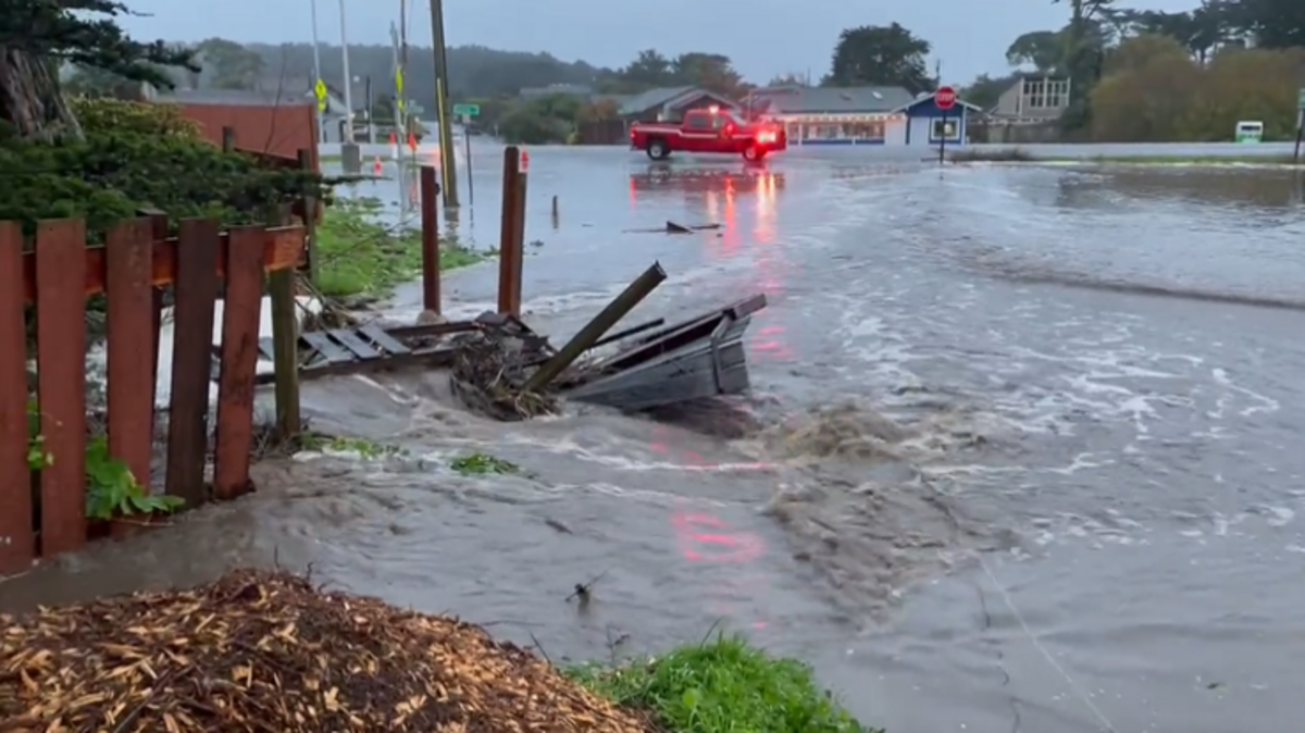In this Dec. 23, 2021, image, flooding in Moss Beach, California, is shown after widespread rain swept across the San Francisco Bay Area. Two bodies were found inside a car submerged in floodwaters in Millbrae, officials said.