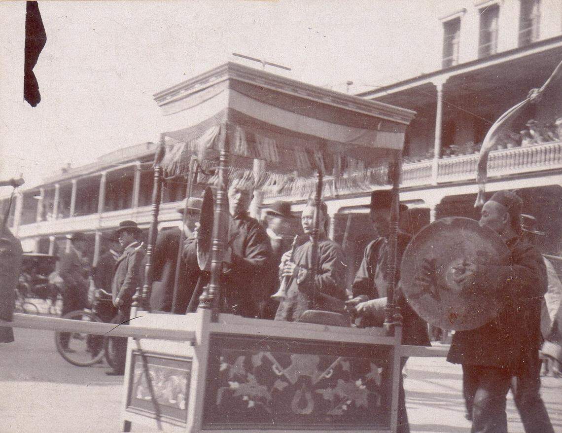 This undated photograph shows Bok Kai parade musicians on D Street in Marysville. The parade and celebration have taken place every year, with one exception, since 1880.