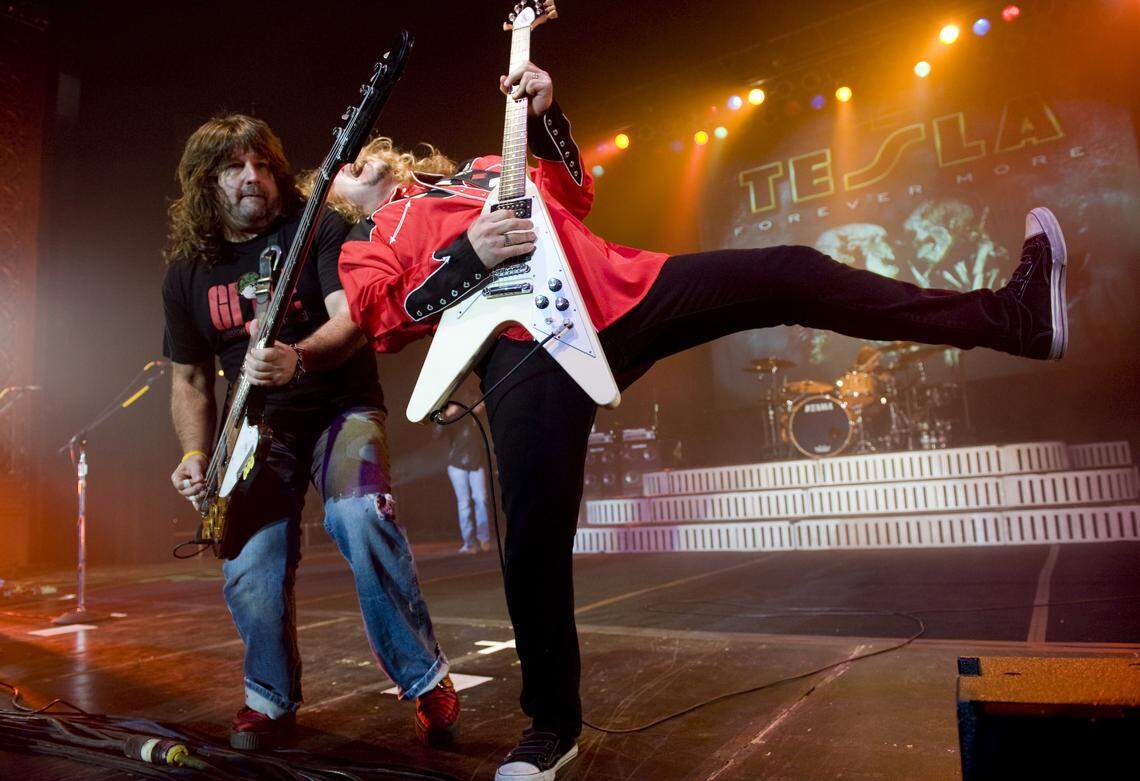 Brian Thomas Wheat, bass guitar, and Frank Anthony Hannon, guitar, of the Tesla perform at the Memorial Auditorium in 2009. The Sacramento band will headline the State Fair’s Toyota Concert Series this summer.