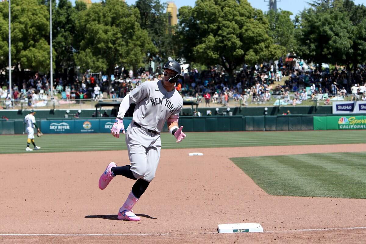 May 10, 2025; West Sacramento, California, USA; New York Yankees designated hitter Aaron Judge (99) rounds the bases after hitting a solo home run against the Athletics during the sixth inning at Sutter Health Park. Mandatory Credit: Dennis Lee-Imagn Images