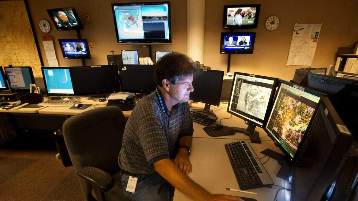 A meteorologist works from the National Weather Service’s Sacramento office in Arden Arcade in 2012. The office, which once provided round-the-clock local forecasting, now faces severe staffing shortages and has ended overnight operations amid federal workforce cuts.