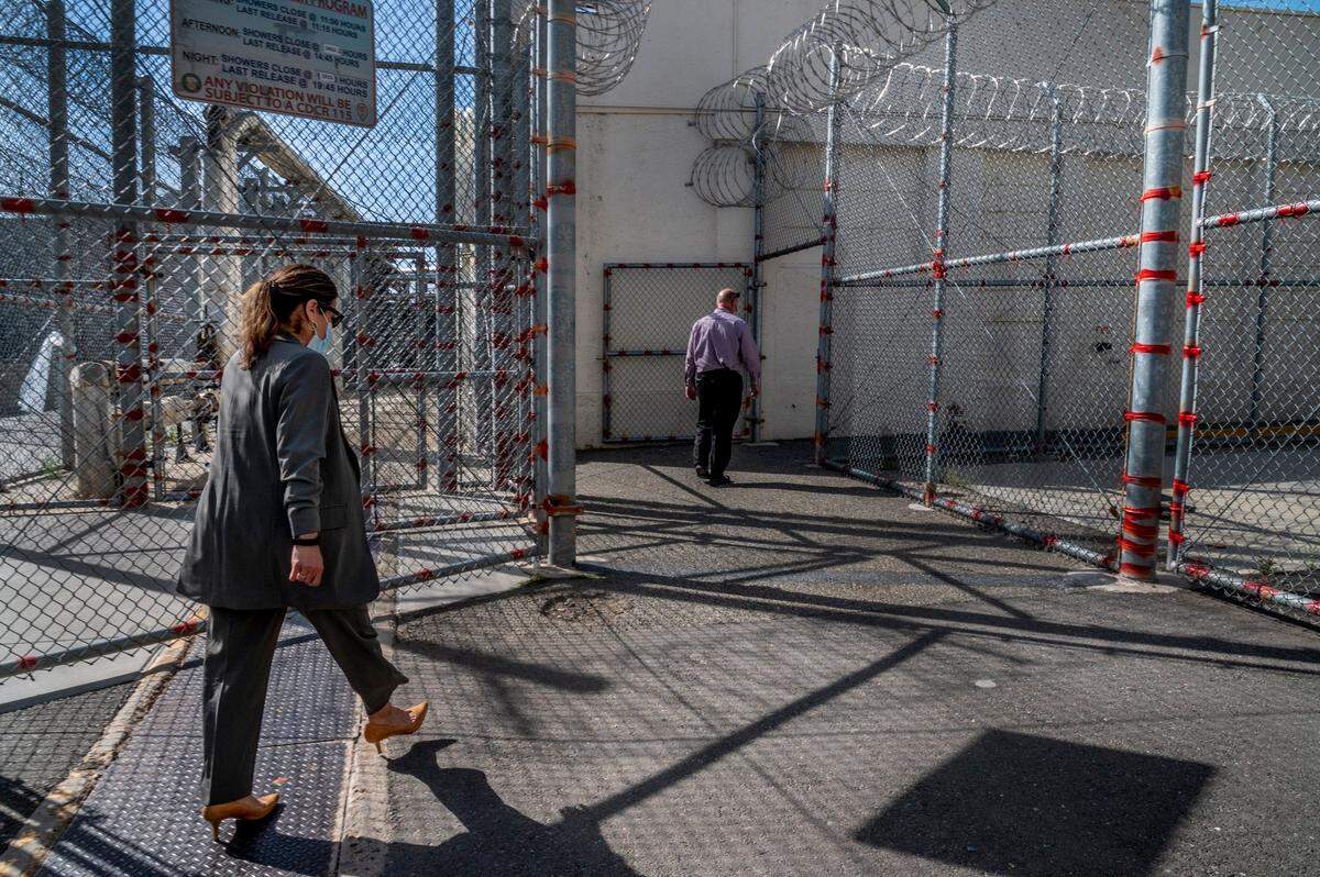 Norma Cumpian, 52, with the Anti-Recidivism Coalition, tours Folsom State Prison for meetings to discuss adding programming for incarcerated people in April. Cumpian was incarcerated for 18 years for second-degree murder after killing her abusive boyfriend.