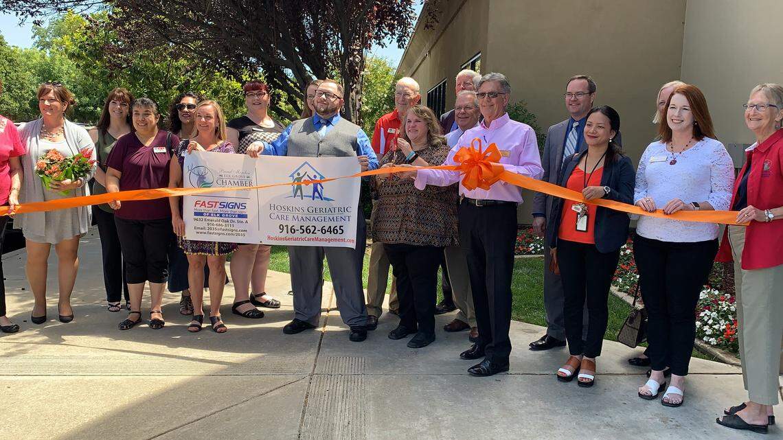 An Elk Grove family hosted a ribbon-cutting ceremony on July 30, 2019, to celebrate the opening of their senior care business. Rachael Hoskins and her son Jesse Hoskins (central) will offer affordable and free services to local older adults.