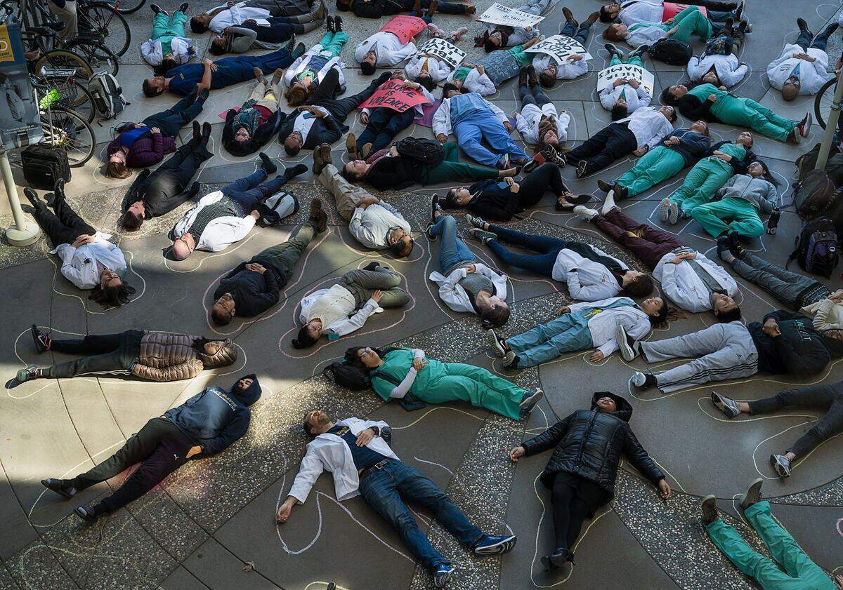 14. UC Davis White Coats for Black Lives, in collaboration with Code Blue and Student National Medical Association, stage a Die-In Demonstration at UC Davis Medical Center on Monday, March 11, 2019 in Sacramento.