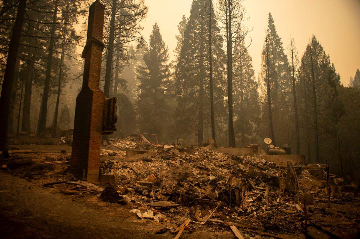 A home on Sugar Pine Drive in Berry Creek was burned during the Bear Fire near Oroville on Wednesday, Sept. 9, 2020. The blaze, part of the larger North Complex burning in Northern California, exploded in size Tuesday night and into Wednesday, forcing evacuation warnings and orders for at least 20,000 people in Butte County and reportedly inflicting widespread damage on the foothill community of Berry Creek.