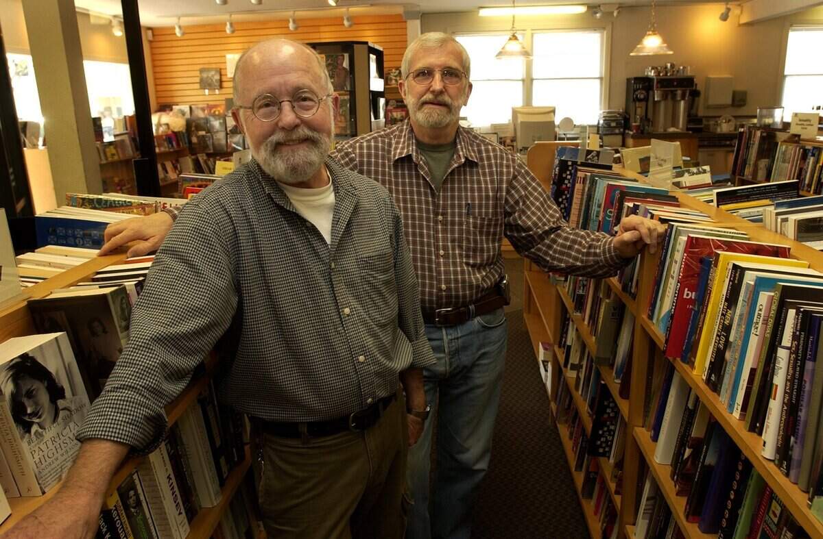 Open Book owners Larry Bailey, left, and Ron Grantz stand in their midtown Sacramento shop in 2005 after they announced that they would be selling the business, a part of the Lavender Heights business community.
