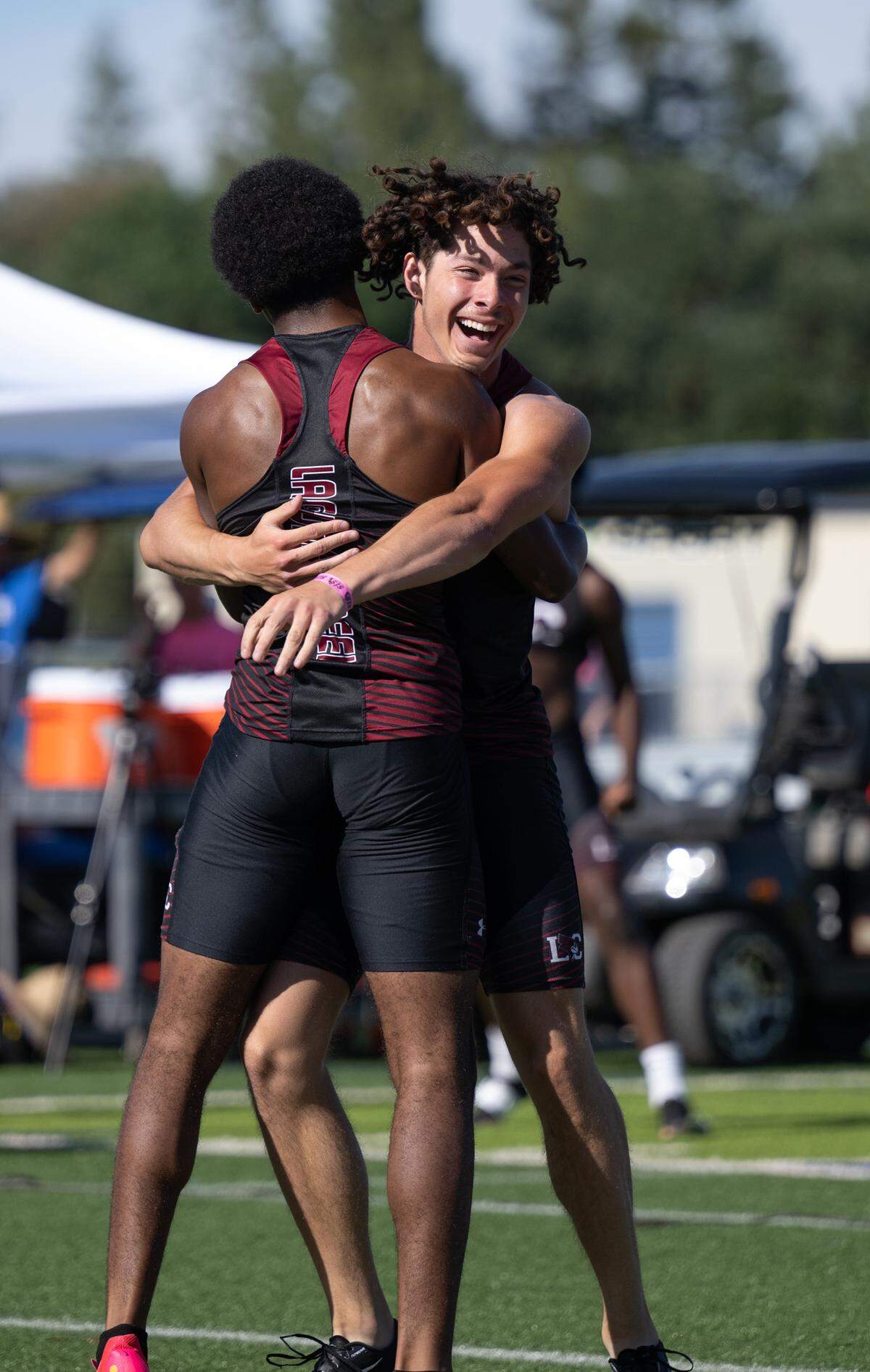 Laguna Creek runners Caleb Kennedy and Malachi Zhurko celebrate qualifying for the state meet in the 4x100 meter race during the CIF Sac-Joaquin Section Masters track finals at Davis High School in Davis, Calif., Saturday, May 20, 2023. The team finished third with a time of 41.94.