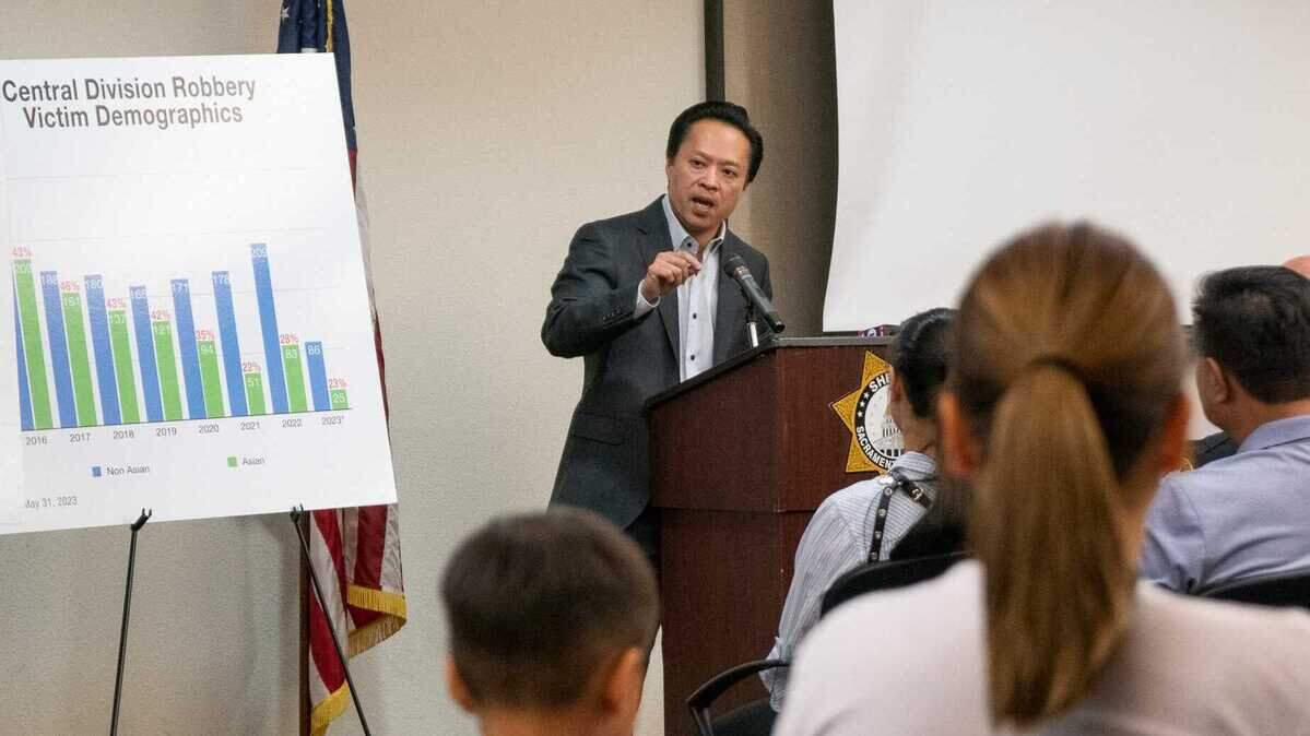 Sacramento County District Attorney Thien Ho speaks to a group of community members in the Little Saigon section of south Sacramento on Thursday, June 15, 2023, following two strong-arm robberies that jolted the neighborhood.