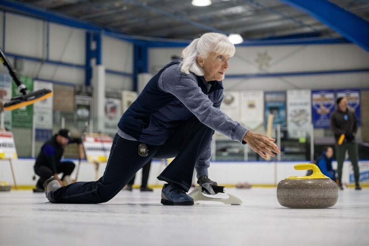 Lee Ann Shearing lets a stone go on Tuesday at Skatetown Ice Arena in Roseville. The Wine Country Curling Club meets at the facility on Sunday mornings and Tuesday nights.