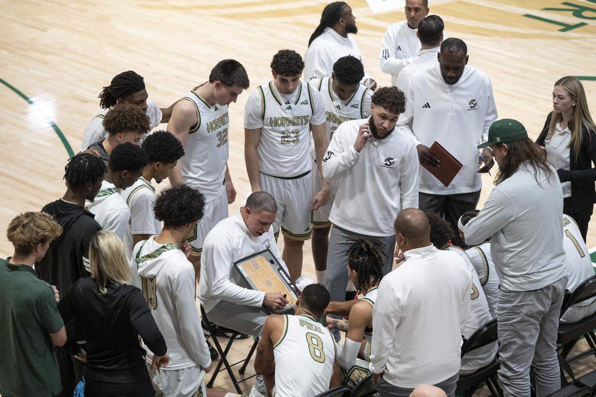 Sacramento State coach Mike Bibby maps out a play during a timeout during a game between Sac State and Presbyterian at Hornet Pavilion in Sacramento on Sunday, Nov. 16, 2025.