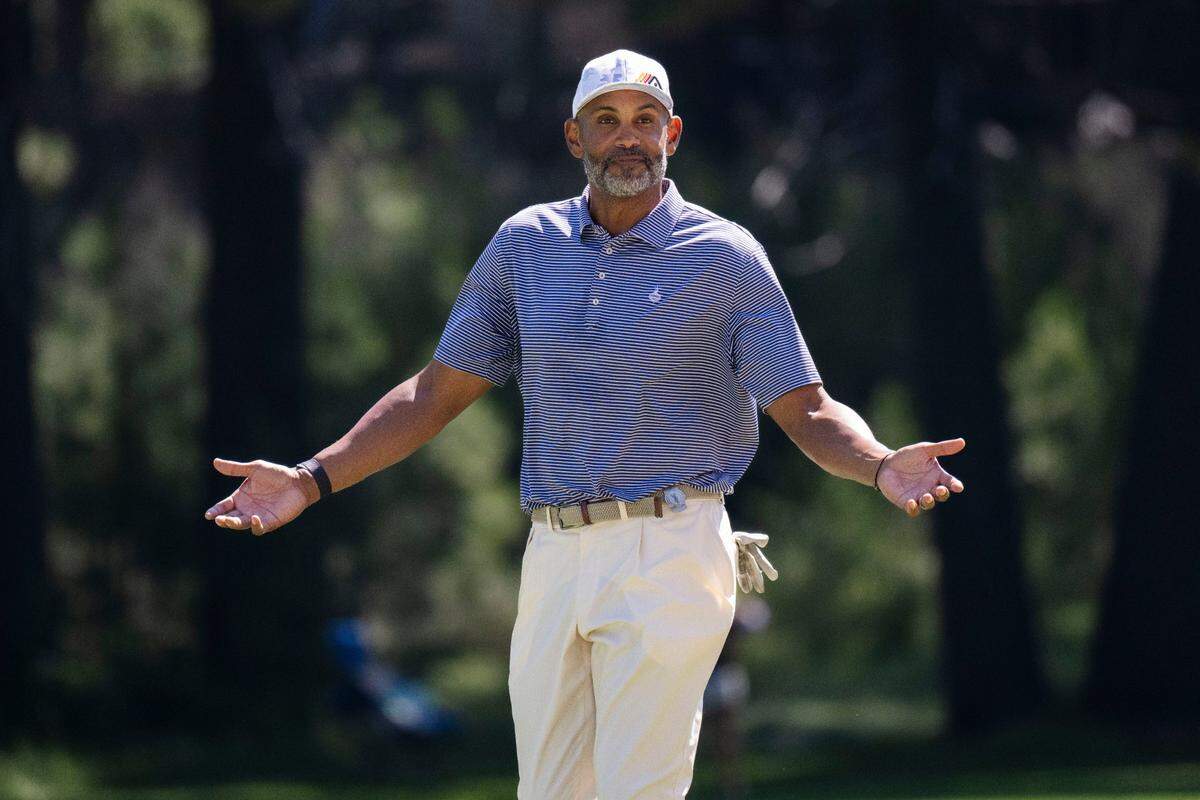 NBA analyst and former All Star Grant Hill gestures to a fan during the final day of the American Century Championship celebrity golf tournament at Edgewood Tahoe Resort in Stateline, Nev., on Sunday, July 13, 2025.