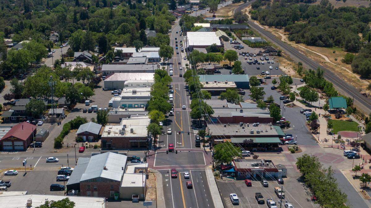 Cars drive on Taylor Road in downtown Loomis on May 12, 2021. 