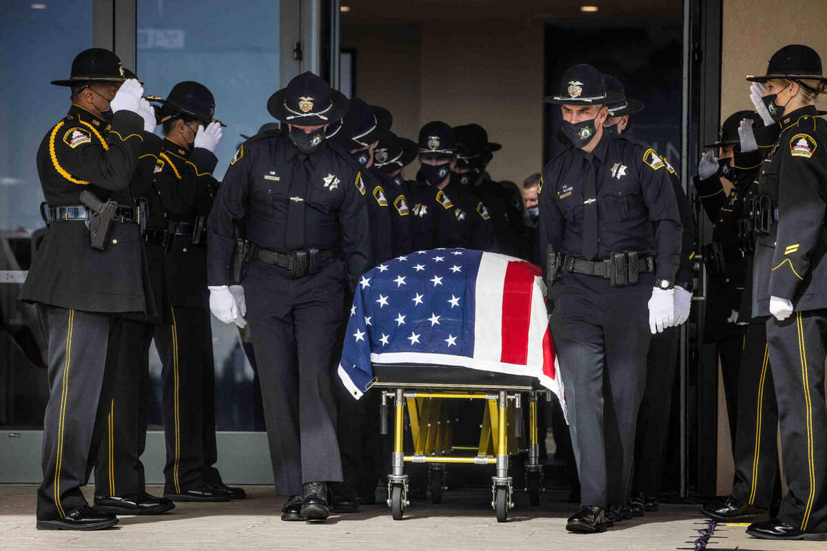 23. The casket carrying Sacramento County Sheriff’s deputy Adam Gibson is brought out by fellow deputies following funeral services at Bayside Church Adventure Campus in Roseville on Wednesday, Feb. 3, 2021.