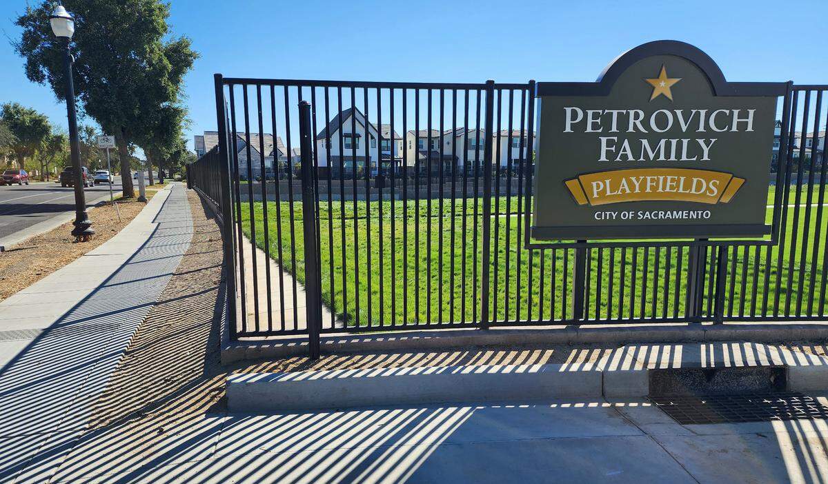 The new plaque at Petrovich Family Playfields, a park in Curtis Park, that corrected the placement of the Dachau Concentration Camp in Poland and changed it to Germany, was removed Oct. 3, 2024, leaving behind the pole on which it was attached.