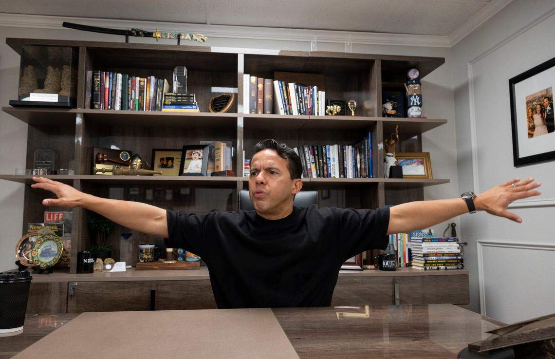 The Rev. Samuel Rodriguez Jr. talks in his office prior to a service at New Season Church earlier this month in south Sacramento.