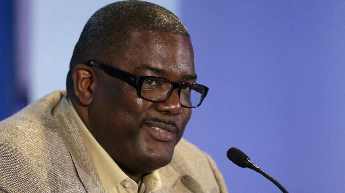 The Detroit Pistons President of Basketball Operations Joe Dumars is seen during a news conference at the Palace of Auburn Hills, Mich., where guard Brandon Jennings was introduced to the media, Tuesday, Aug. 6, 2013. Jennings comes from the Milwaukee Bucks, who acquired Brandon Knight, Slava Kravtsov and Khris Middleton in a sign-and-trade deal last week. Jennings signed a 3-year, $24-million deal as part of the deal. (AP Photo/Carlos Osorio)