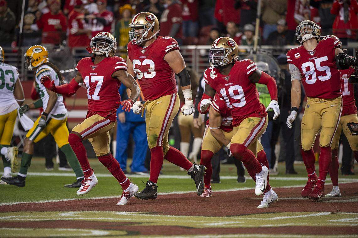 San Francisco 49ers celebrate after running back Raheem Mostert (31) scored a touchdown in the fourth quarter against the Green Bay Packers during the NFC Championship at Levi’s Stadium on Sunday, Jan. 19, 2020 in Santa Clara.