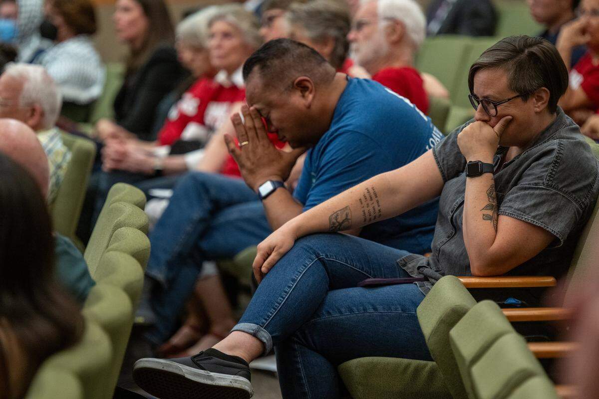 Angela Hassell, director of homeless services provider Loaves & Fishes, reacts as the Sacramento City Council passes an ordinance on Tuesday to ban homeless individuals from sleeping overnight outside City Hall. Hassell had spoken earlier against the ordinance. "This will cause more harm through this damaging policy. When will we stop punishing people living in poverty?" she said.
