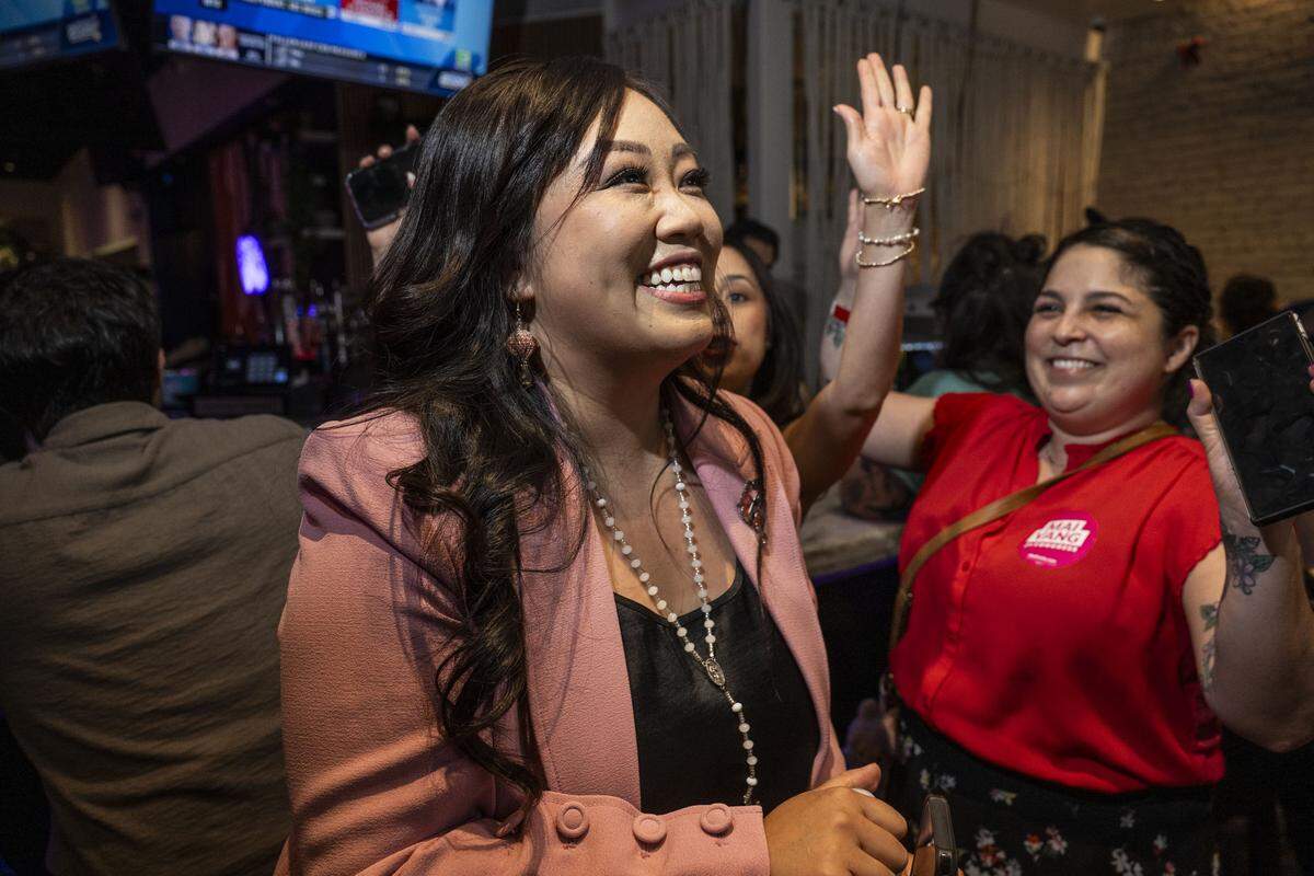 Sacramento City Councilmember Mai Vang, a candidate for the 7th Congressional District, celebrates early returns with former City Councilmember Katie Valenzuela during her election night party at The Lock & Key in midtown Sacramento on Tuesday.