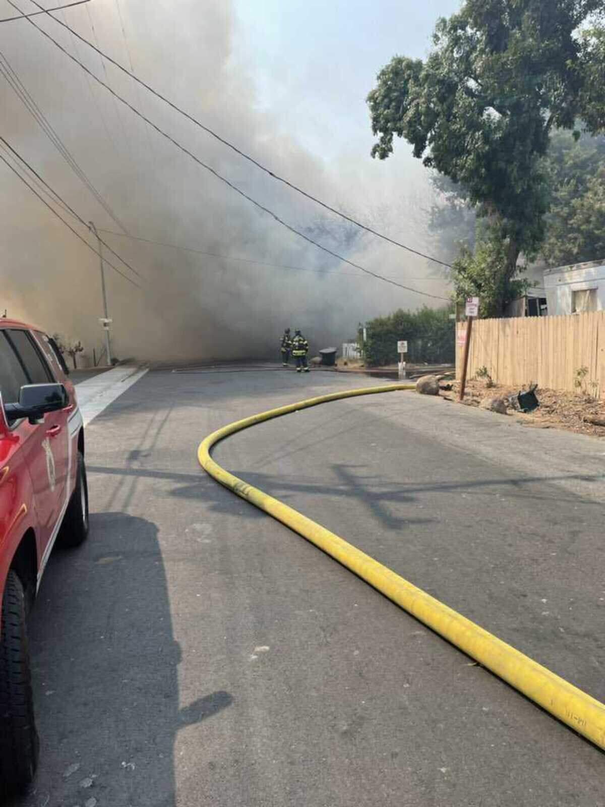 A two-alarm fire broke out among several mobile homes along Den Avenue on Friday, Aug. 27, 2021, and prompted evacuations in south Sacramento, California.