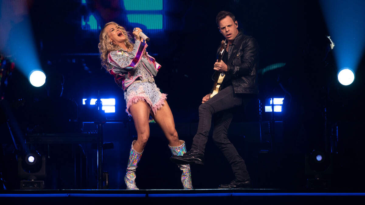 Carrie Underwood jams with guitarist Ed Eason while performing during her Denim & Rhinestones Tour at Golden 1 Center in Sacramento on Tuesday night.