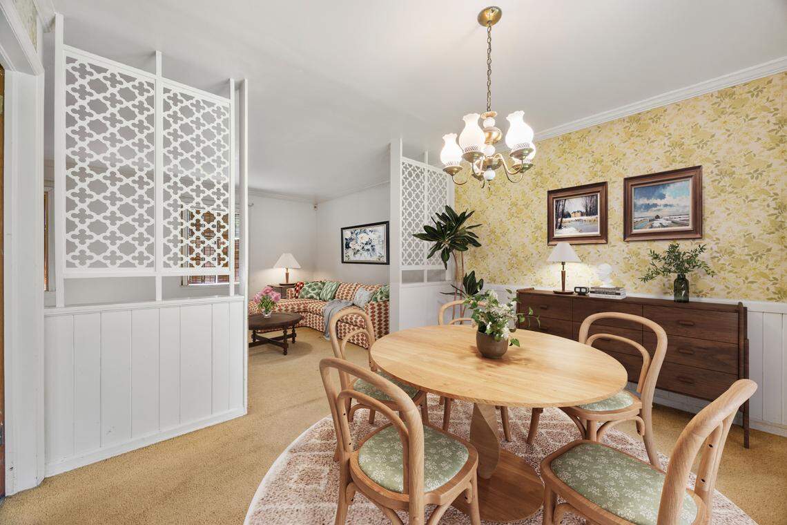 The five-bedroom, three-bathroom home is a bit of a fixer-upper, and the interior looks dated — but it’s listed at $350,000.