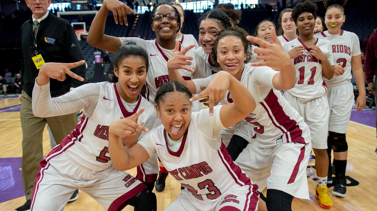 With Juliana Edinburgh (23) in front, West Campus girls basketball teamcelebrates its 49-45 overtime victory over Union Mine in the Sac-Joaquin Section Division IV championship game, the Friday afternoon’s section final between Liberty Ranch and Sonora at the Golden 1 Center.
