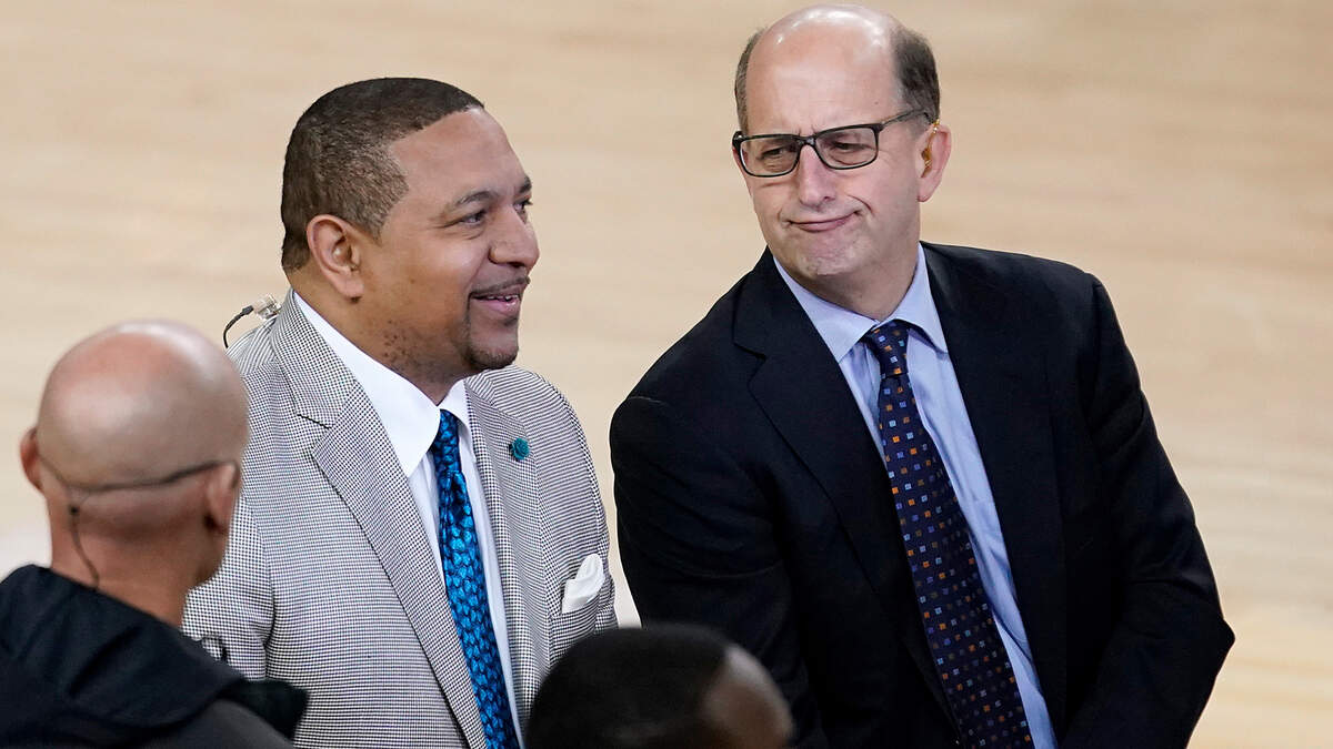 Mark Jackson, left, and Jeff Van Gundy talk before Game 4 of basketball’s NBA Finals between the Golden State Warriors and the Toronto Raptors in Oakland, Calif., Friday, June 7, 2019. ABC/ESPN NBA analyst Jackson credits faith, confidence and longtime friendships with Van Gundy and Mike Breen as the main catalysts for his longevity and why he is working his 12th NBA Finals. (AP Photo/Tony Avelar)