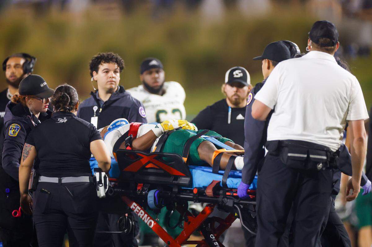 Sacramento State’s Michael Johnson (23) is taken off the field on a stretcher after he was injured in a kick off return against San Jose State in the fourth quarter at CEFCU Stadium in San Jose, Calif., on Thursday, August 29, 2024. (Shae Hammond/Bay Area News Group)