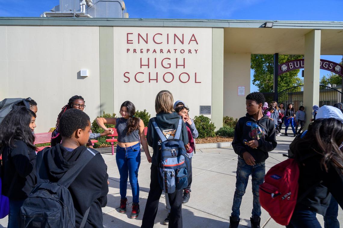 Students walk in the courtyard after school is over at Encina Preparatory School on Thursday, November 7, 2019 in Sacramento.