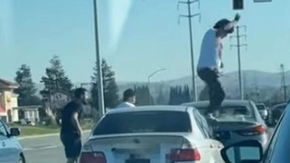 A man accused of breaking a window in a road rage attack, shattering glass into a dog’s eyes, has been arrested, California police say.