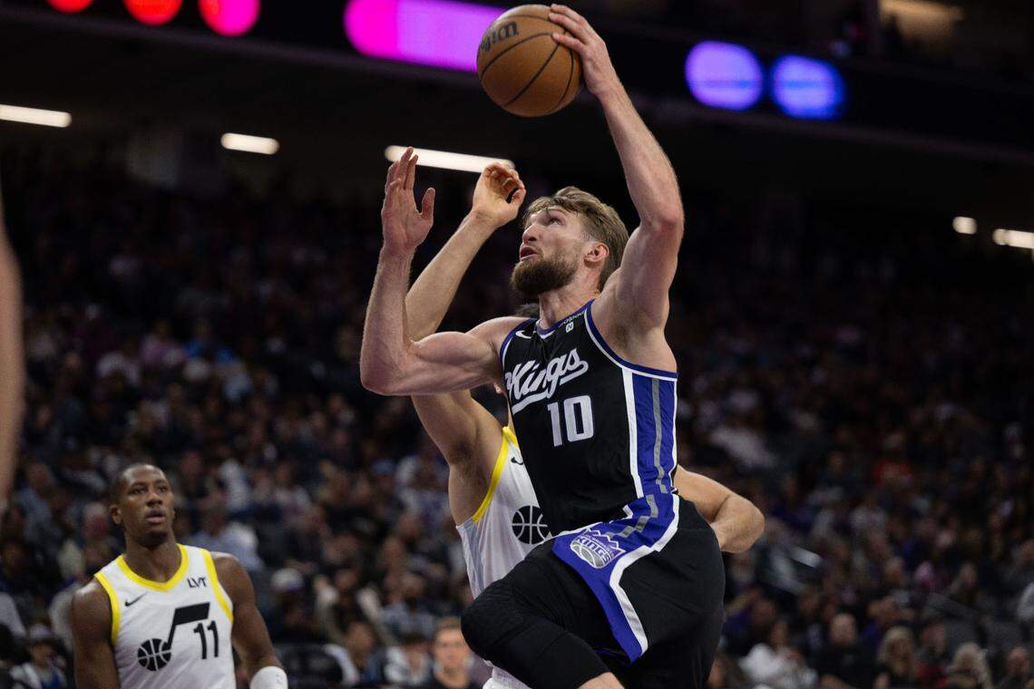 Sacramento Kings forward Domantas Sabonis (10) drives to the basket during an NBA game against the Utah Jazz on Sunday, March 31, 2024 at Golden 1 Center.