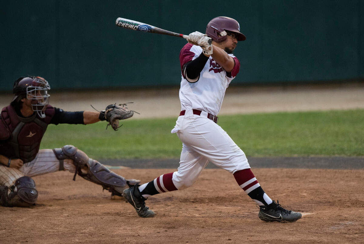 Sierra College shortshop Zach Chamizo puts the ball in play during the fifth inning against Saddleback on Sunday in the California community college state championship tournament at Folsom Lake College.
