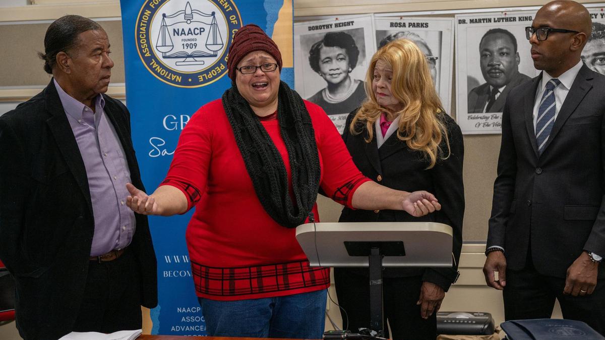 Michelle Buckner gives an emotional account of the stress on her mother, Dorothy Buckner, 80, center right, during a press conference with Greater Sacramento NAACP interim president Ardell La’Mond Harrison, left, and Buckner’s attorney Brandon A. Kline, right, in November at the NAACP’s headquarters on 44th Street. Dorothy’s property in Colfax is threatened in an adverse possession case.